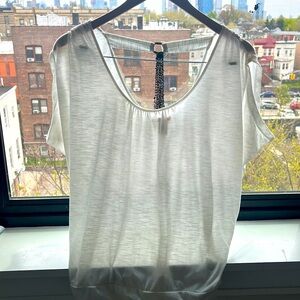 White shirt with bead detail